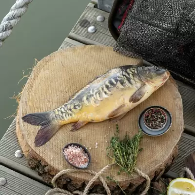 Карп потрошённый без головы